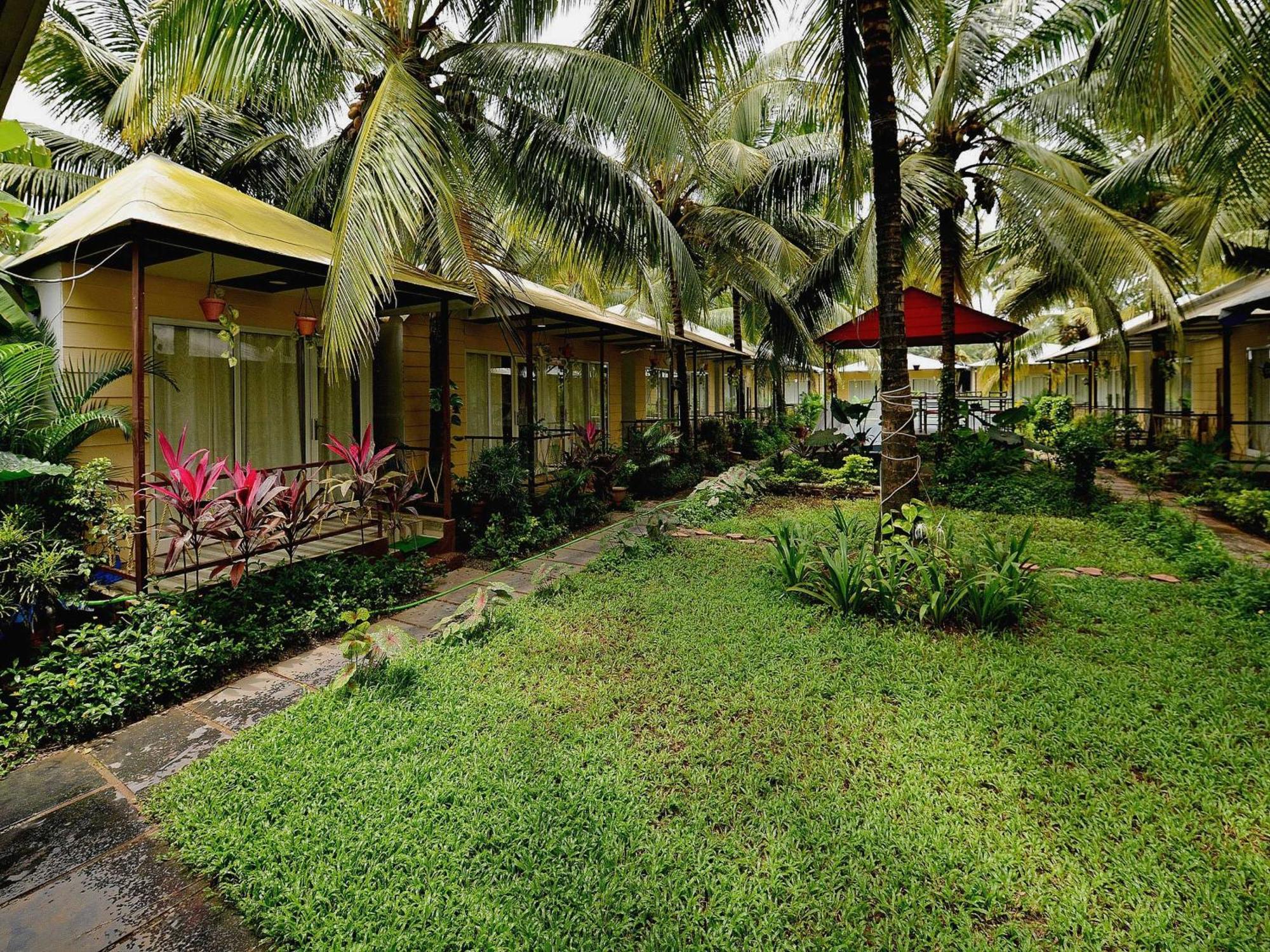 Collection O Retreat Morjim Resort Buitenkant foto