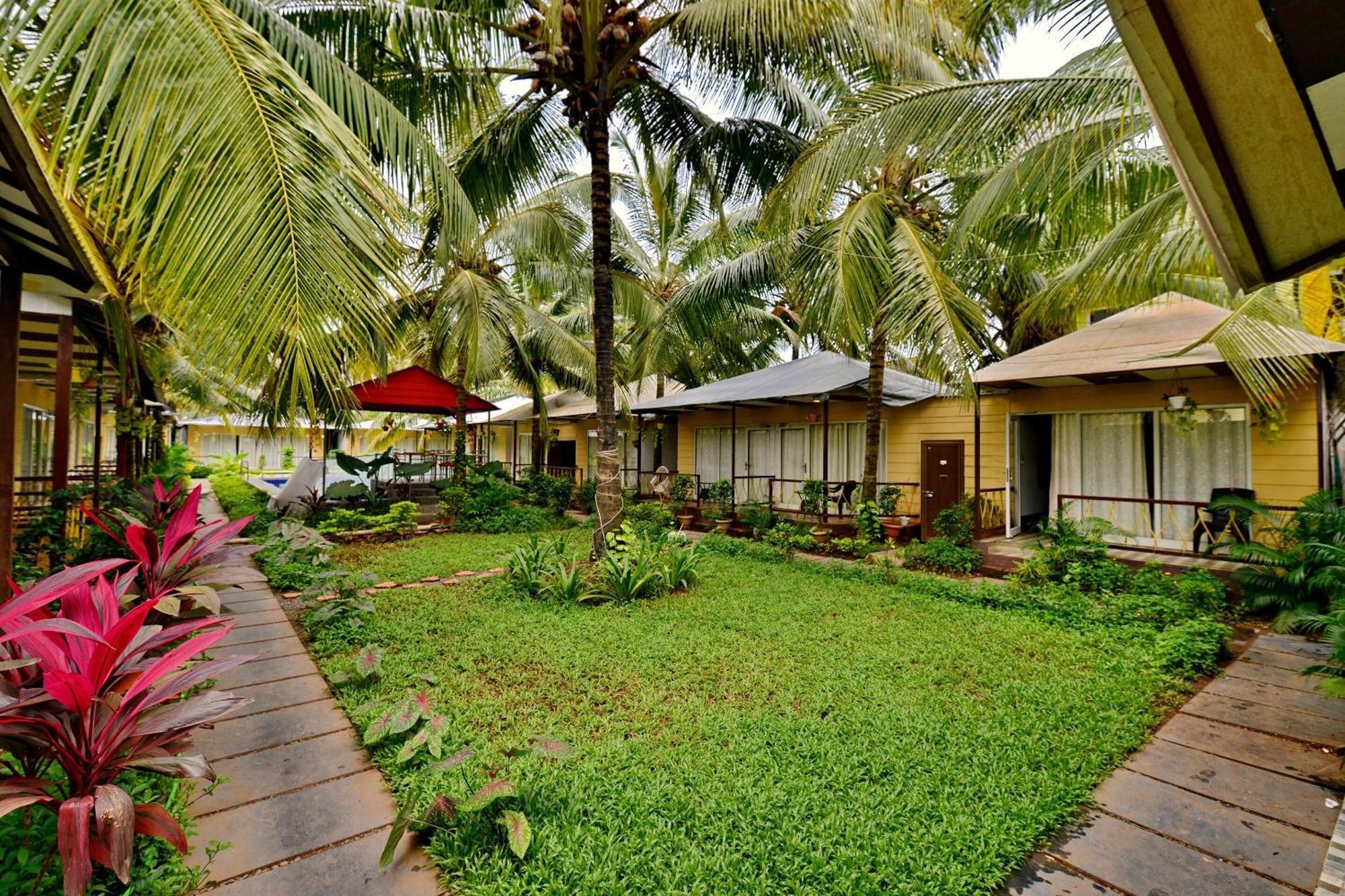 Collection O Retreat Morjim Resort Buitenkant foto