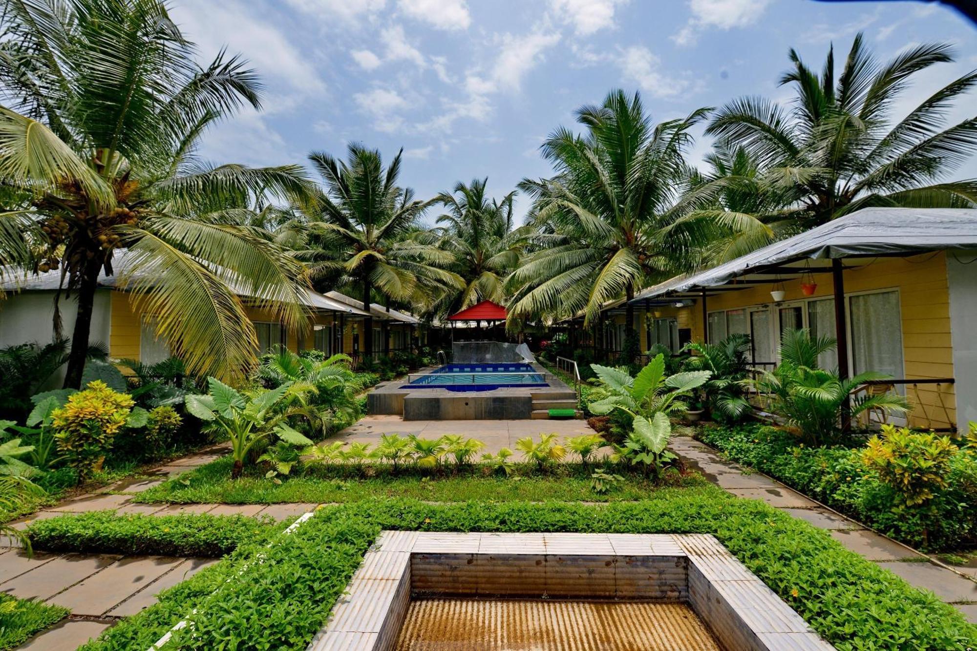 Collection O Retreat Morjim Resort Buitenkant foto