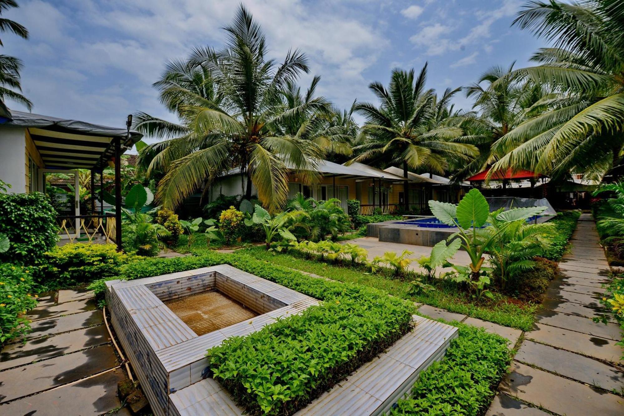 Collection O Retreat Morjim Resort Buitenkant foto