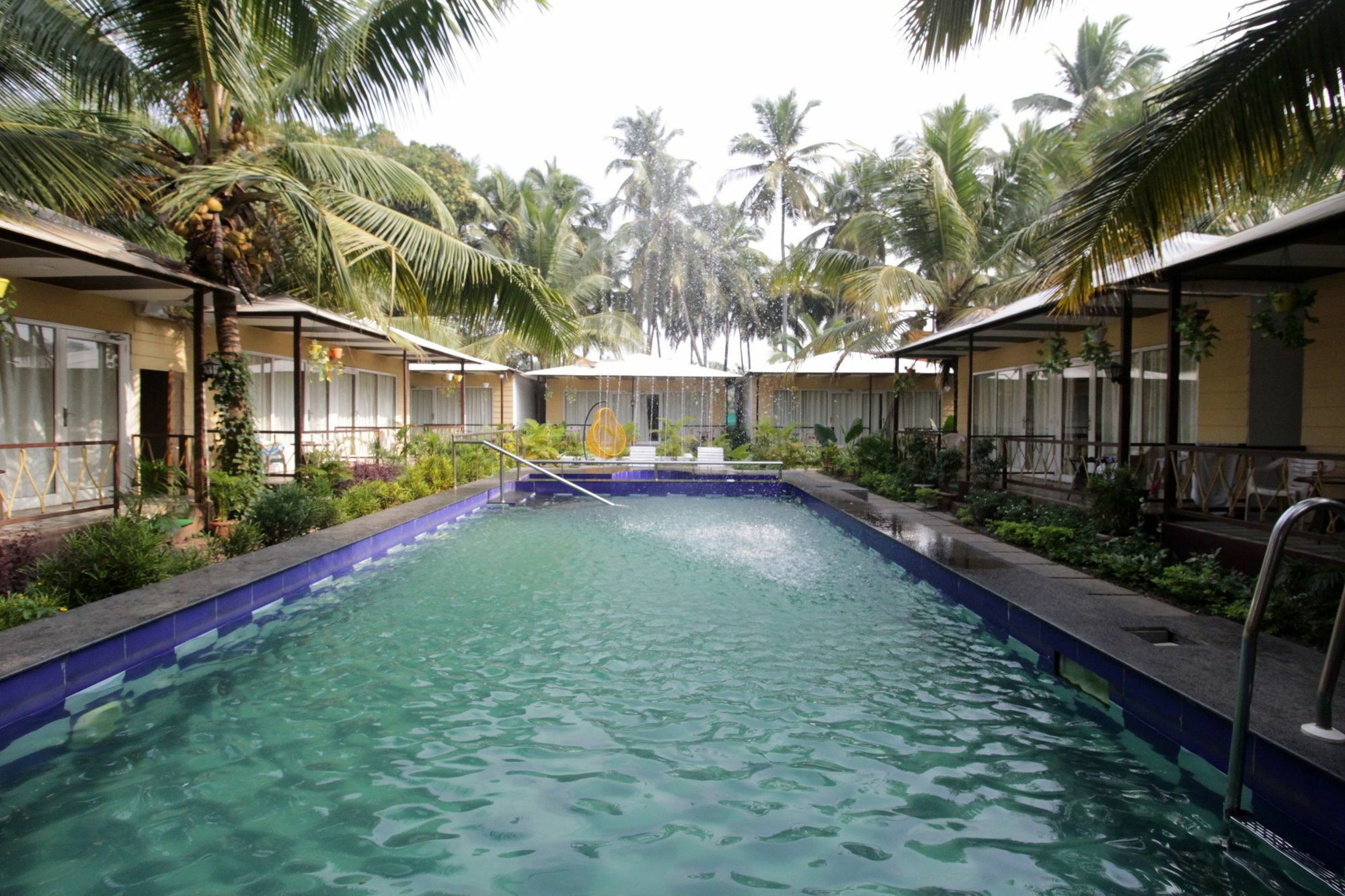 Collection O Retreat Morjim Resort Buitenkant foto